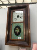 A 19th century American wall clock