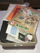 A box of GB commonwealth and world stamps including.