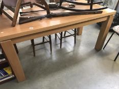 A pine effect kitchen table