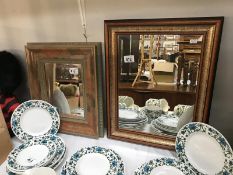 2 decorative wooden framed mirrors