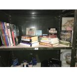 A shelf of war related books