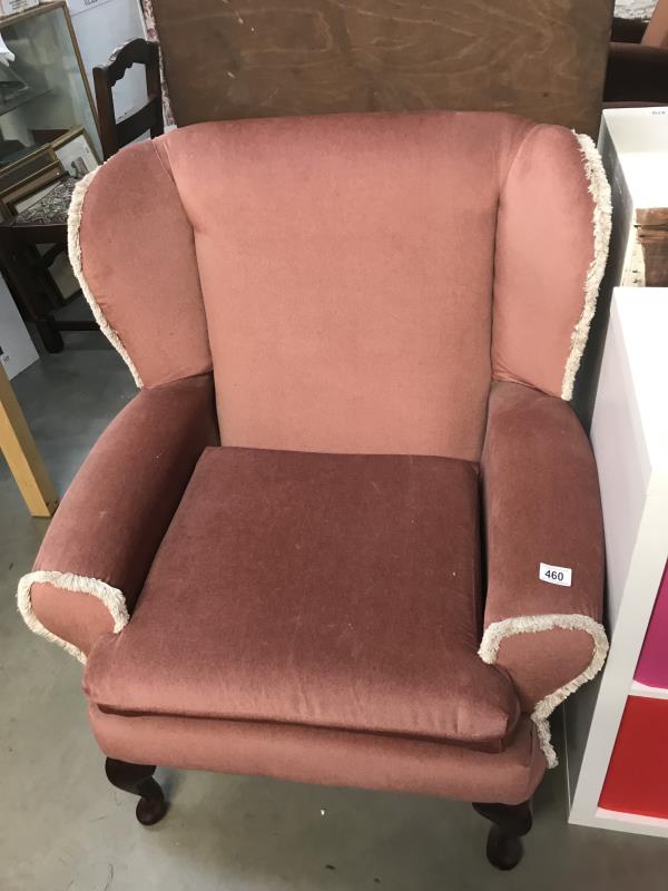 A wing armchair