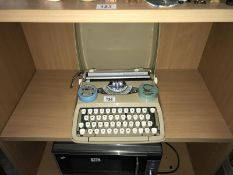 An Empire Corona Deluxe vintage typewriter