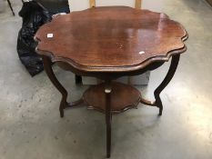 A dark wood oval occasional table