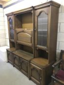 A large dark oak 3 piece wall unit