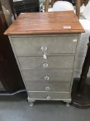 A painted 5 drawer chest