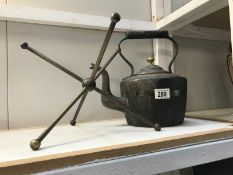 An old kettle and stand
