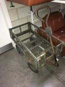 A metal 4 wheel trolley