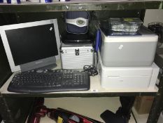 A HP printer, Epsom printer, monitor, keyboard etc.