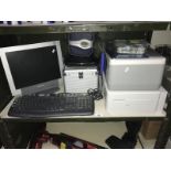 A HP printer, Epsom printer, monitor, keyboard etc.