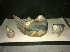 3 carved wooden birds