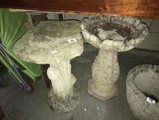 A garden birdbath and 1 other item