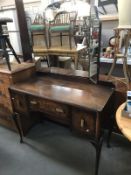 A 1930's triple mirror dressing table