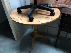 A circular pine table