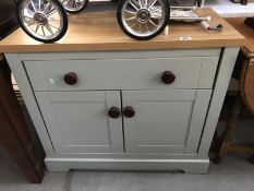 A Painted pine cupboard