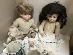 A vintage doll and 1 other