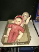 A vintage pedigree doll and 1 other