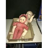 A vintage pedigree doll and 1 other