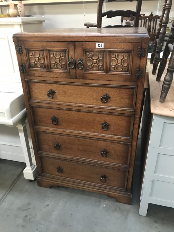 A 4 drawer chest with 2 doors