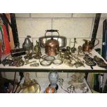 A shelf of brass/copper incl. vintage kettle, candlesticks etc.