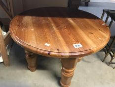 A round pine coffee table
