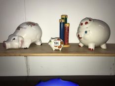 3 piggy banks and 1 other money box