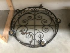 A wrought iron electrolier ceiling light