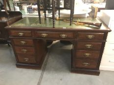 An old leather topped writing desk