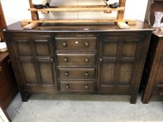 A dark wood sideboard