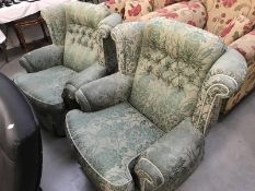 2 green armchairs