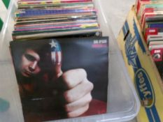A box of mixed albums including Status Quo, Elton John, Don McLean etc.