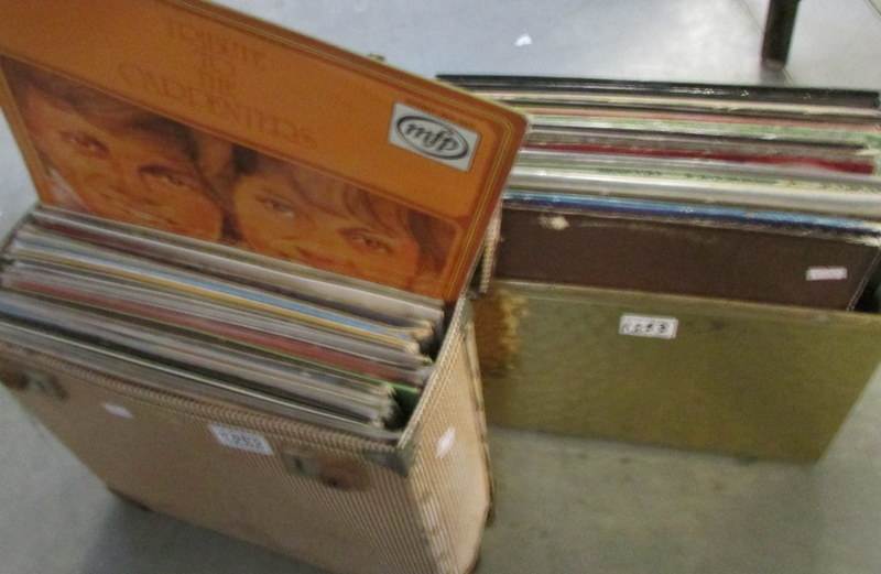 2 cases of assorted LP records.