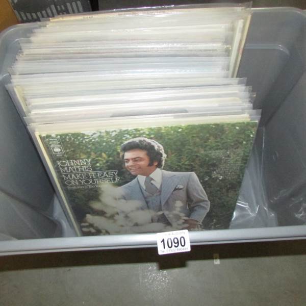 A box of mixed LP records, mainly male singers.