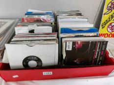 3 trays of mostly 70's and 80's 45 rpm records.