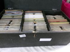 A case of mostly 70's and 80's 45 rpm records.