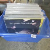 A box of approximately 40 records including Stevie Winwood, Rod Stewart etc.