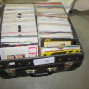 A box of 45 rpm records, 70's/80's pop, rock etc.