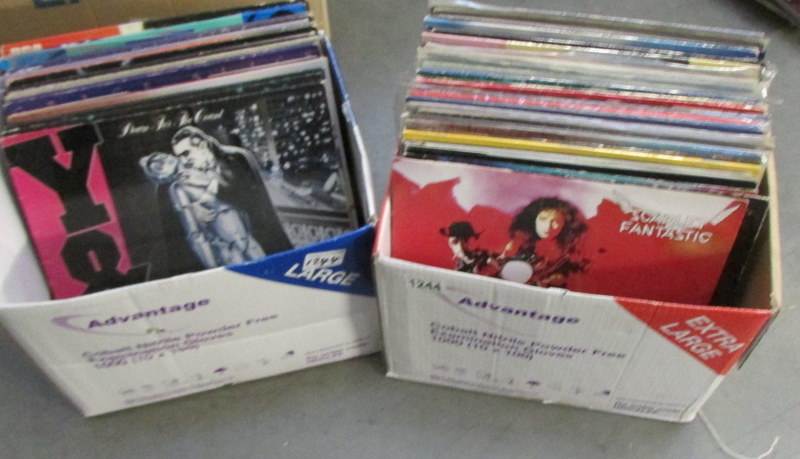 2 boxes of mainly rock and pop LP records and 12" singles.