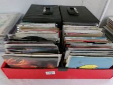 4 boxes of 45's, soul, pop, rock including some 1960's.