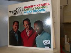 Contemporary jazz poll winner three album, Barney Kessell, Shelly Manne, Ray Brown,