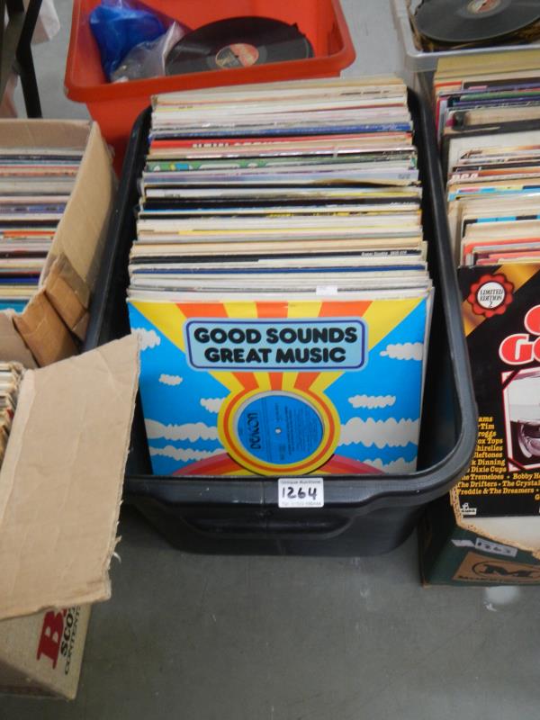 A box of mixed records