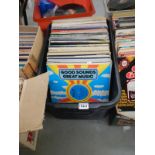 A box of mixed records