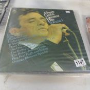 Approximately 29 Johnny Cash albums.