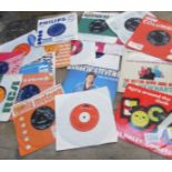 A small mixed lot of 45 rpm records including The Hollies, Dusty Springfield, Bill Haley etc.