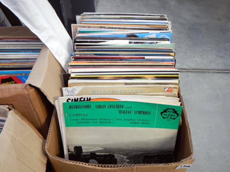 A box of mixed records