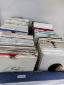 4 trays of 45's, disco soul, rock and pop records.