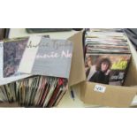 2 boxes of 45 rpm 70's/80's rock and pop records.