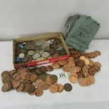A mixed lot of coins including pre decimal pennies.