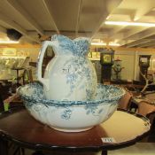 A 19th century jug and basin set with soap dish.