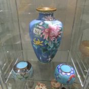 A tall cloissonne' vase and 2 cloissonne' bowls.